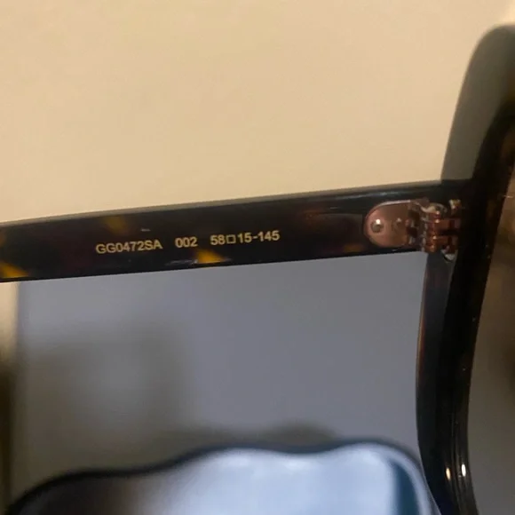 Authentic Brand new with no tags Gucci Sunglasses, brown. With sunglass case